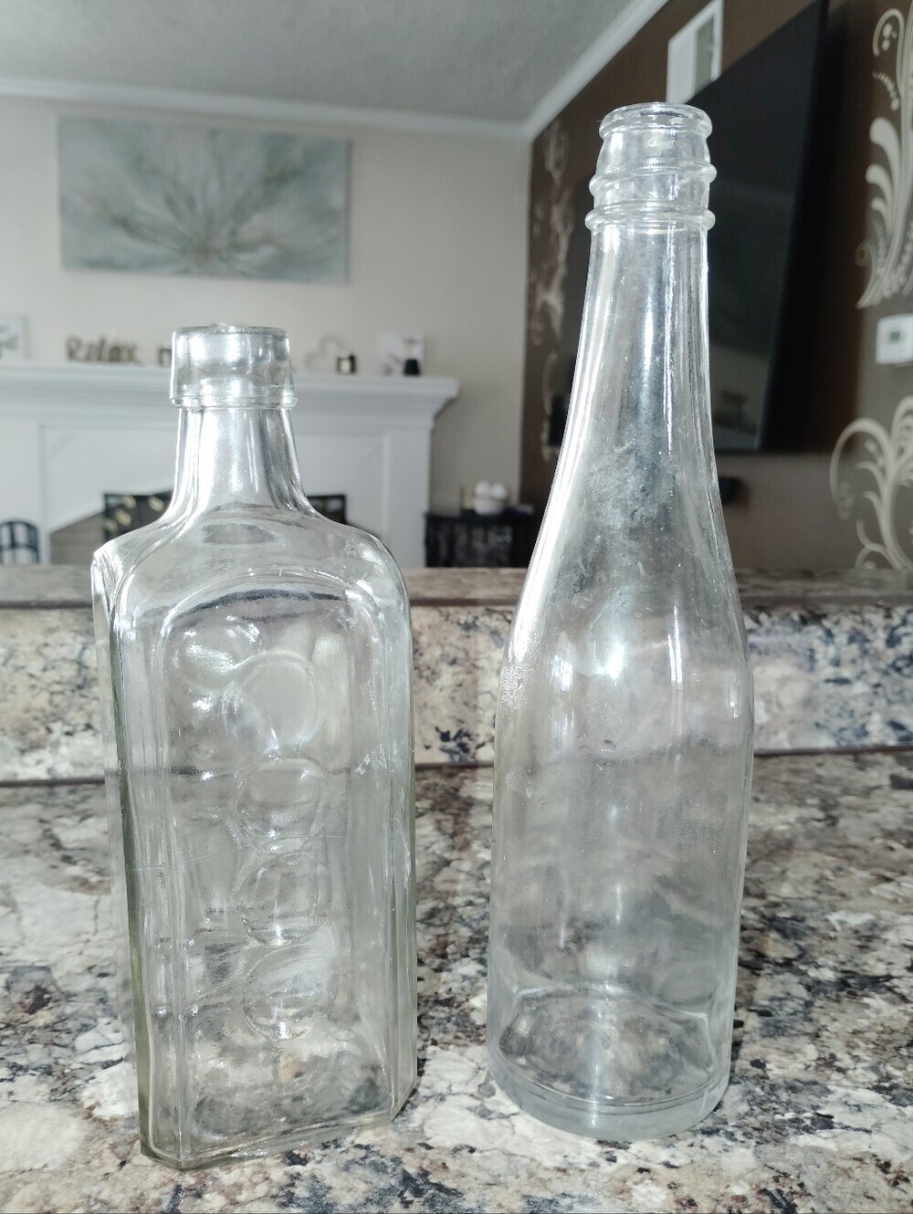 **Title:** Vintage Antique Clear Glass Bottles (Set of 2) – Beautiful Decor